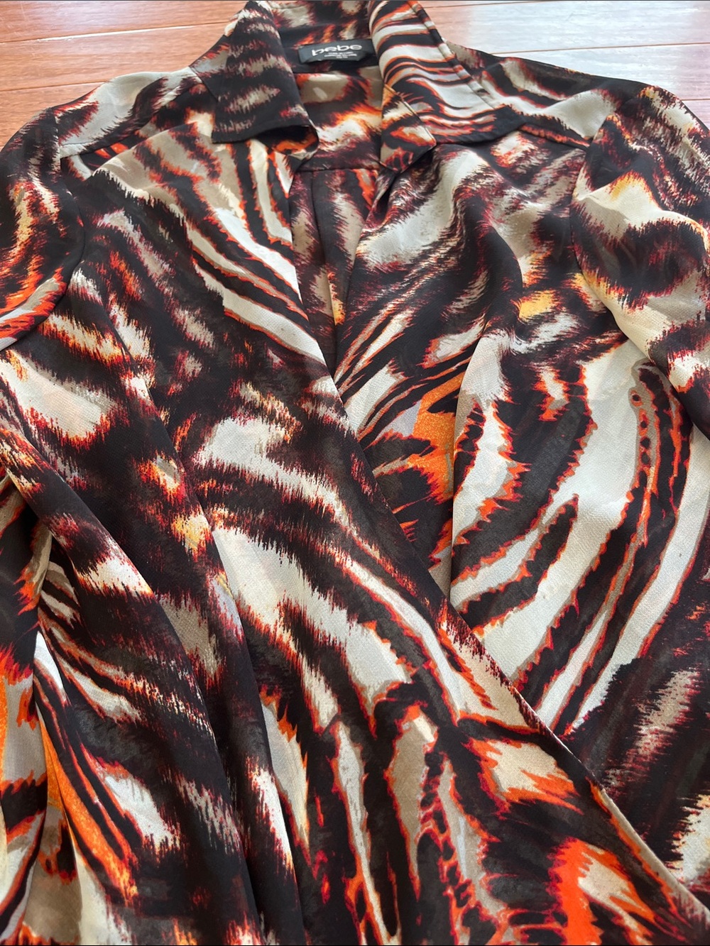 bebe Printed Twist-Front Long Sleeve Top in Multi-Color - Picture 4 of 6